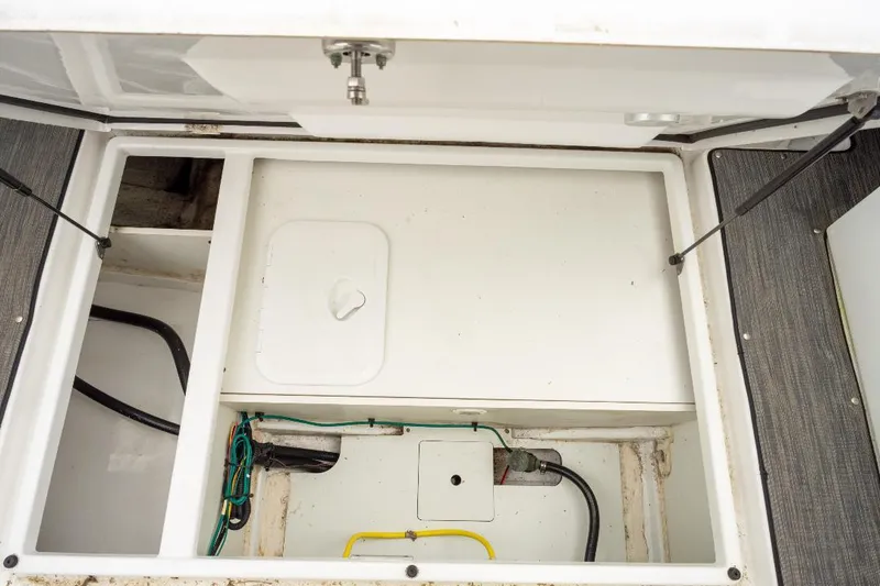Slide: The Image of Storage compartment of 2021 Jeanneau NC Weekender 795 Series 2 boat, showing interior details. - 36