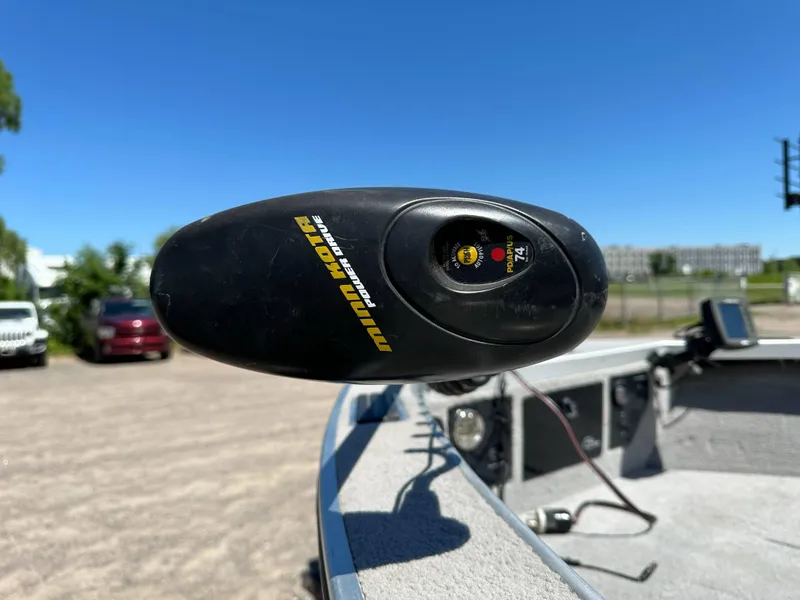 Slide: The Image of Minn Kota PowerDrive trolling motor on a 2005 G3 1875 boat, clear sky background. - 18