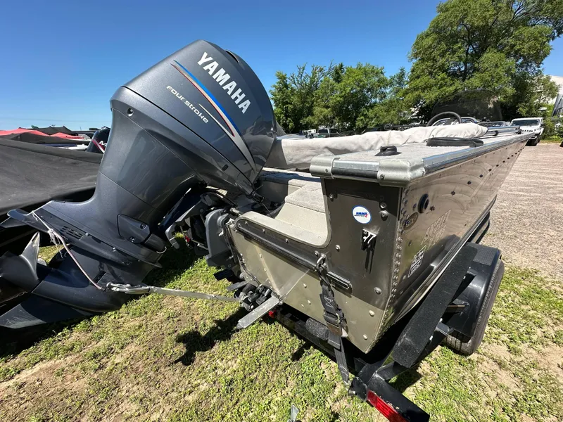 Slide: The Image of Aluminum boat with Yamaha outboard motor, G3 model 1875, year 2005, on a trailer. - 24