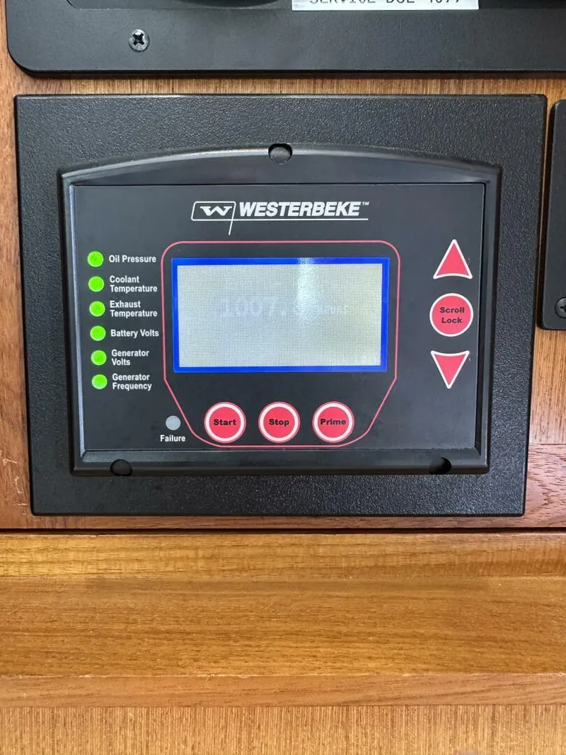 Slide: The Image of Westerbeke control panel on 2006 Cabo 48 Convertible, displaying engine metrics and controls. - 20