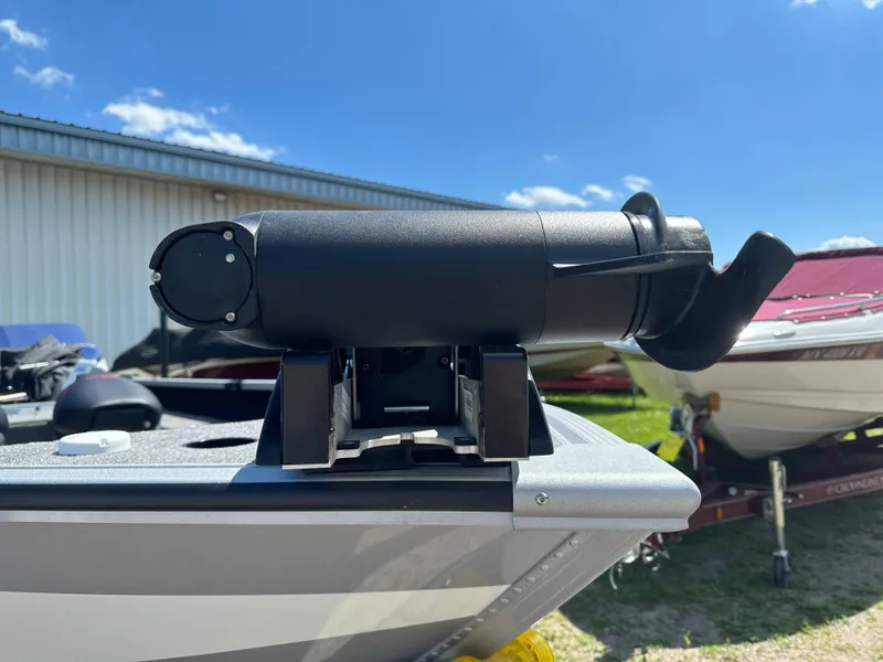 Slide: The Image of 2023 Alumacraft Competitor 185 Tiller boat with mounted black trolling motor. - 15