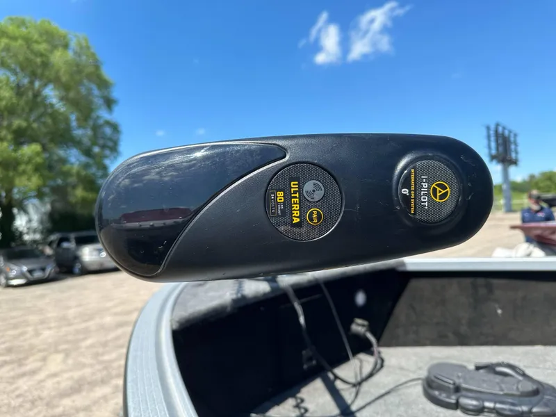 Slide: The Image of 2023 Alumacraft Competitor 185 Tiller with Ulterra i-Pilot motor, outdoor setting. - 27