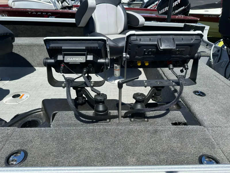 Slide: The Image of 2023 Alumacraft Competitor 185 Tiller with Garmin and Lowrance fish finders on deck. - 28