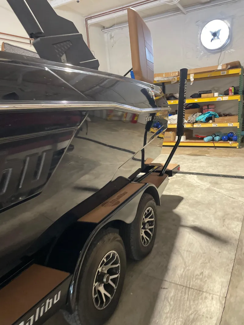 Slide: The Image of 2022 Malibu Wakesetter 23 LSV on trailer in storage facility. - 12