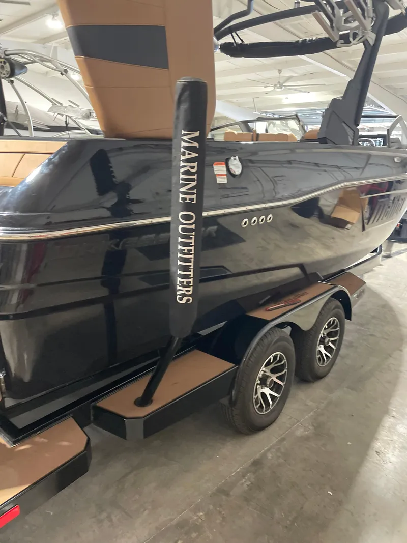 Slide: The Image of 2022 Malibu Wakesetter 23 LSV boat on trailer in showroom. - 6