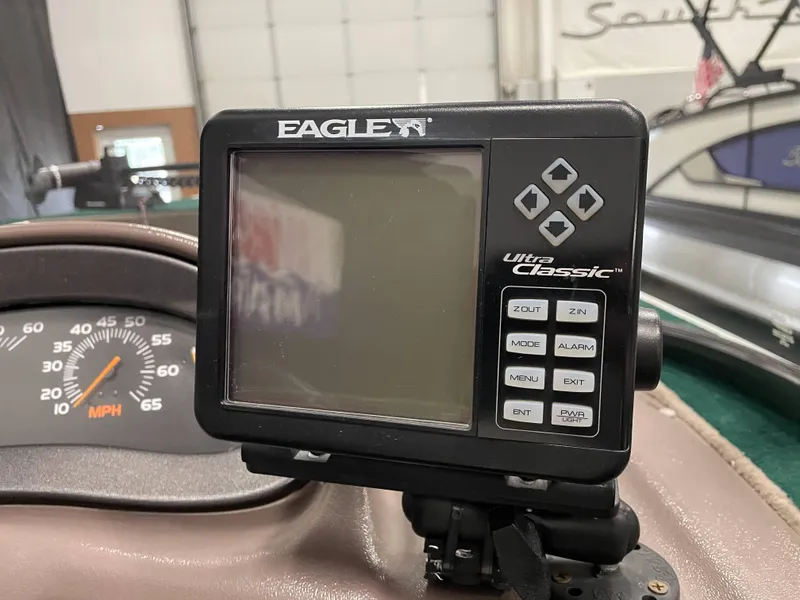 Slide: The Image of Open storage compartment in 2000 Starcraft Superfisherman 176 DC boat. - 34