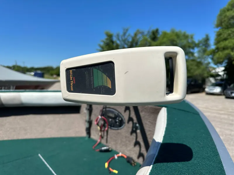 Slide: The Image of Aerial view of 2000 Starcraft Superfisherman 176 DC boat with green interior and four seats. - 5