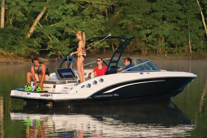 Slide: The Image of Manufacturer Provided Image: 2016 Chaparral 246 SSi boat with people enjoying water activities. - 2