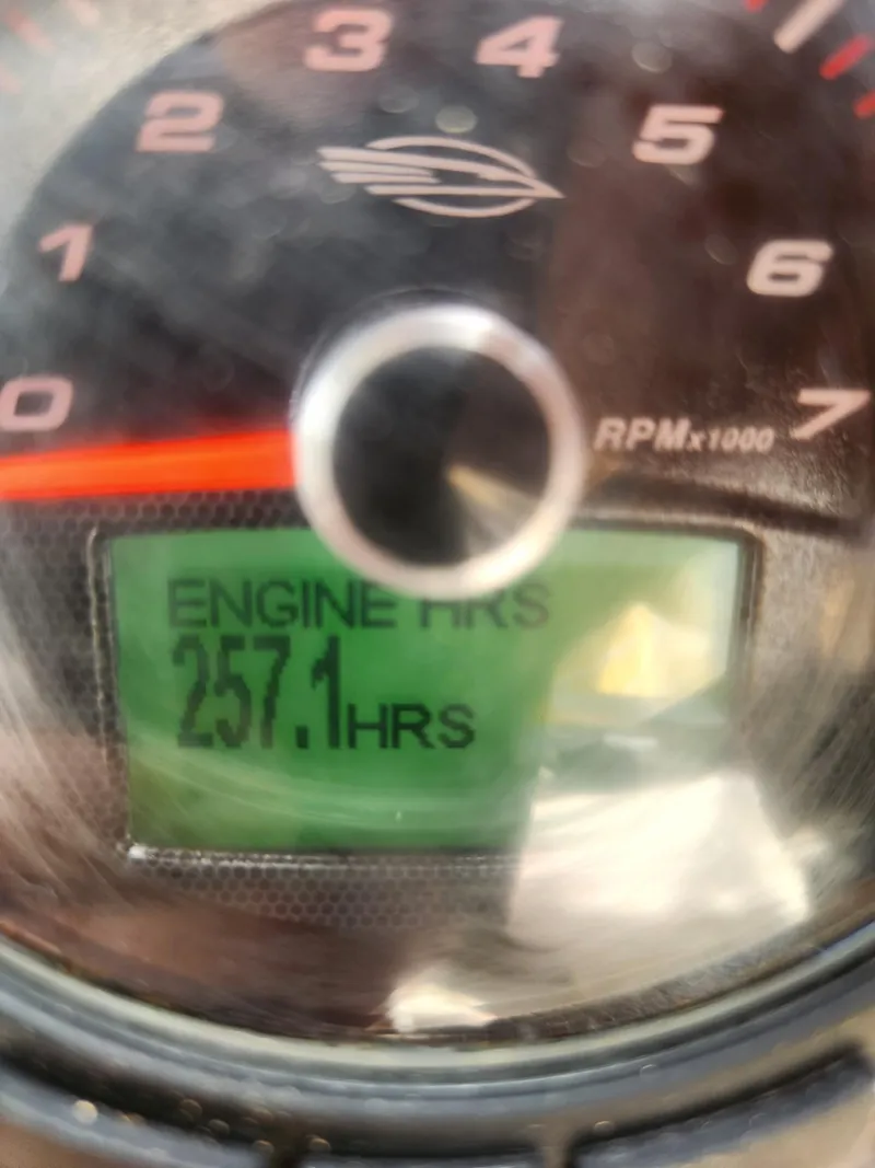 Slide: The Image of Close-up of Chaparral 246 SSi 2016 engine hour meter showing 257.1 hours. - 25
