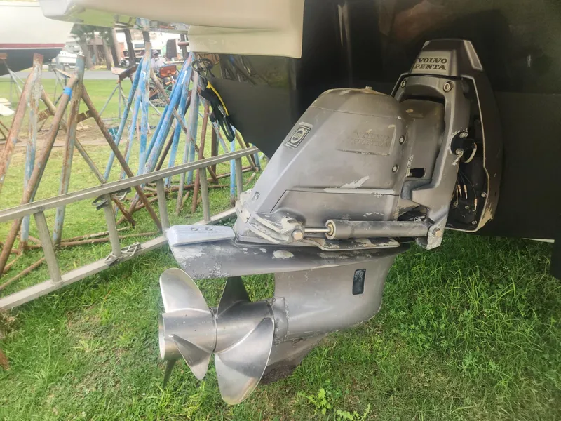 Slide: The Image of 2016 Chaparral 246 SSi boat with Volvo Penta outdrive on grass. - 26