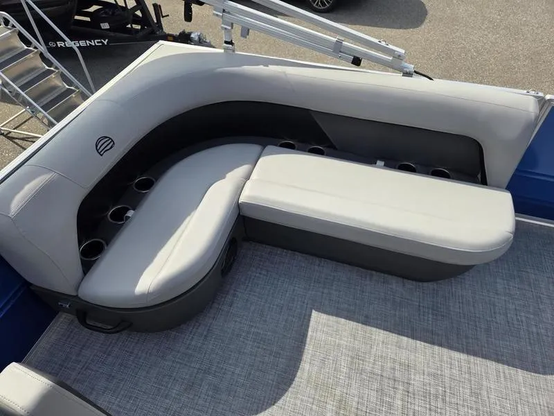 Slide: The Image of 2026 Sun Tracker PB 16 DLX boat seating with cup holders and gray upholstery. - 4