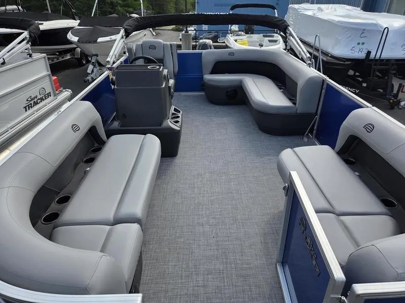 Slide: The Image of 2026 Sun Tracker PB 16 DLX pontoon boat with spacious seating and modern design. - 9