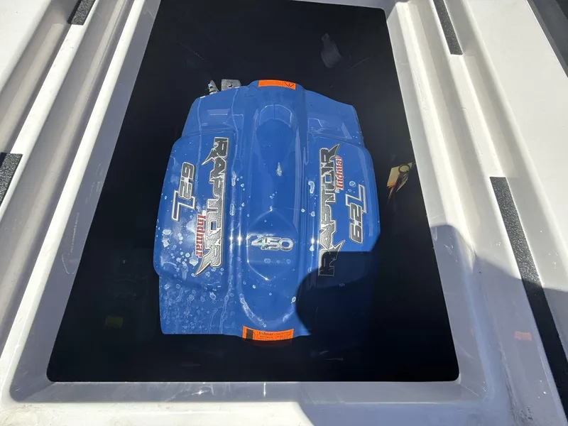 Slide: The Image of 2021 Moomba Mojo boat engine, Raptor 6.2L, in a compartment. - 20