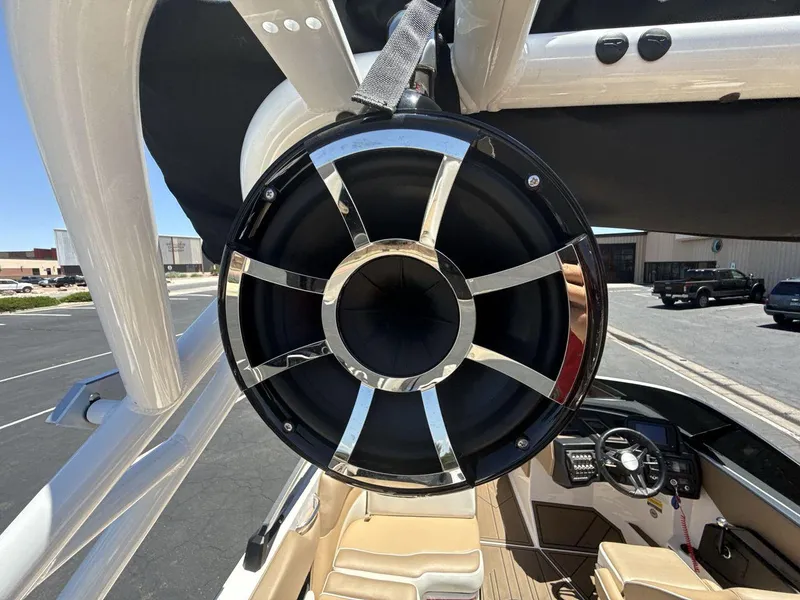 Slide: The Image of 2021 Moomba Mojo boat with large speaker on wakeboard tower. - 21