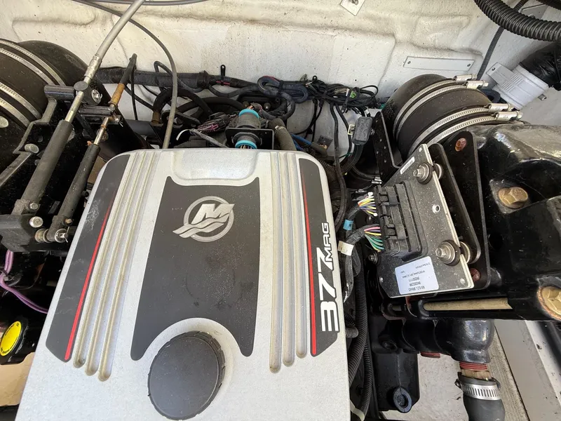 Slide: The Image of Engine compartment of a 2009 Crownline 270 BR boat featuring a 377 MAG engine. - 34