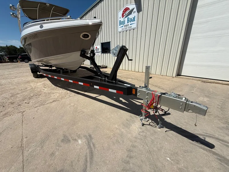 Slide: The Image of 2009 Crownline 270 BR boat on trailer outside Boji Boat Brokers building. - 39