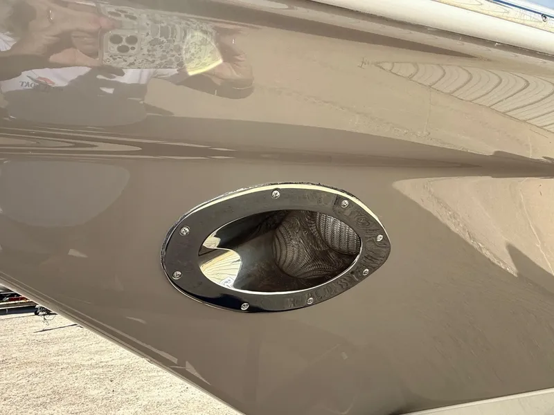 Slide: The Image of Close-up of a 2009 Crownline 270 BR boat exhaust outlet. - 5