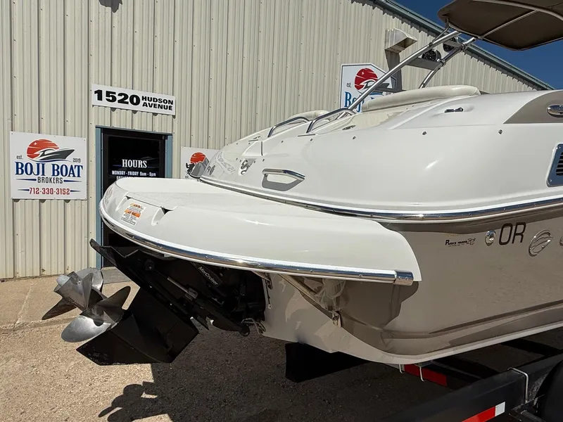 Slide: The Image of 2009 Crownline 270 BR boat at Boji Boat Brokers, exterior view with propeller. - 9