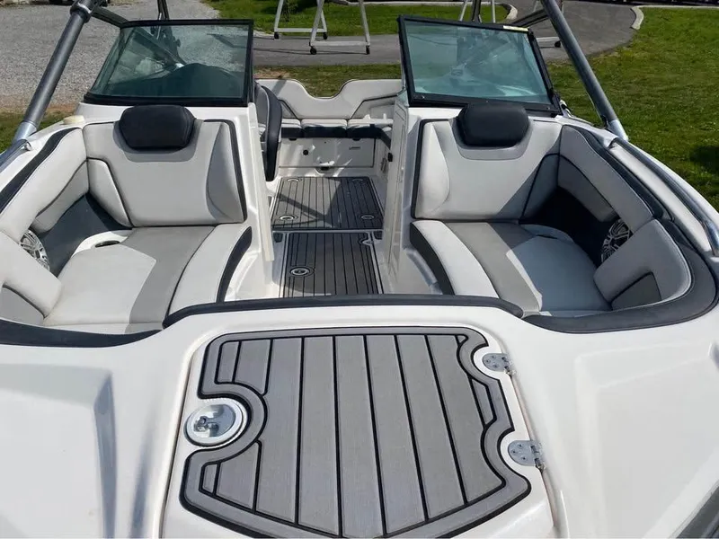 Slide: The Image of 2015 Yamaha Boats 212X interior with sleek seating and modern design. - 3