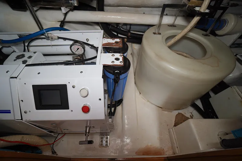 Slide: The Image of Engine room of 2009 Marlow 61E yacht with machinery and gauges. - 45