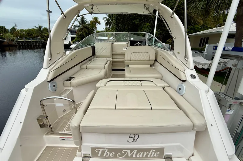 Slide: The Image of 2021 Regal 26 XO boat interior with beige seating and open deck. - 40