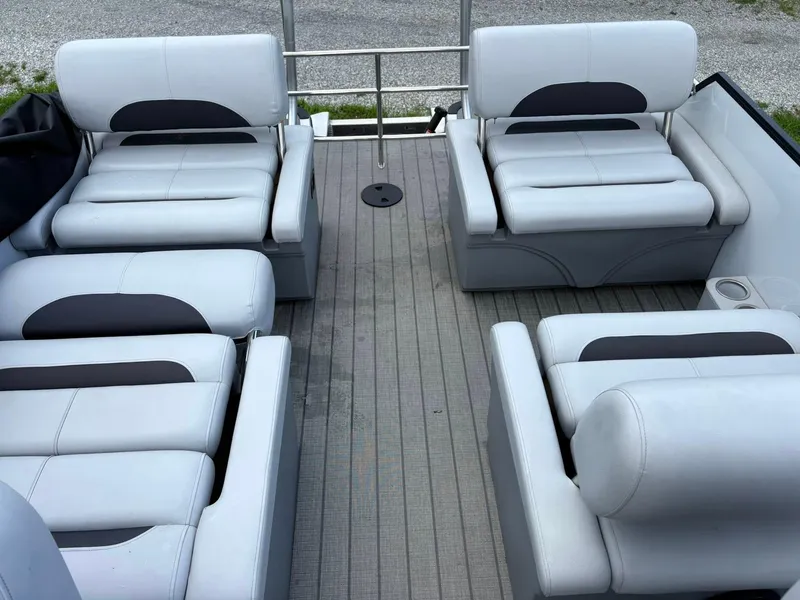 Slide: The Image of 2024 Bentley Pontoons Legacy QSB interior with luxurious seating arrangement. - 16