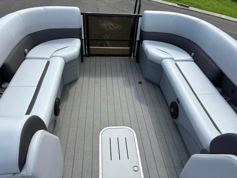 Slide: The Image of 2024 Bentley Pontoons Legacy QSB interior with spacious seating and modern design. - 4