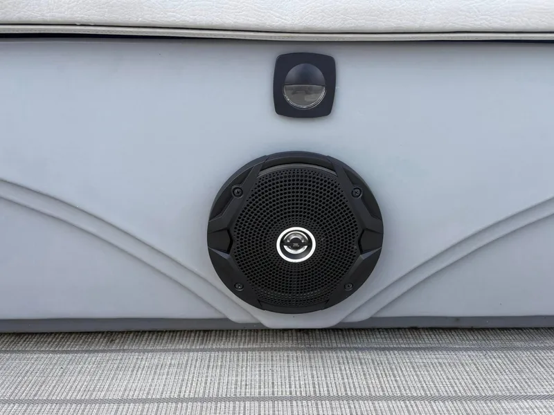 Slide: The Image of 2024 Bentley Pontoons Legacy QSB speaker detail on sleek interior panel. - 5