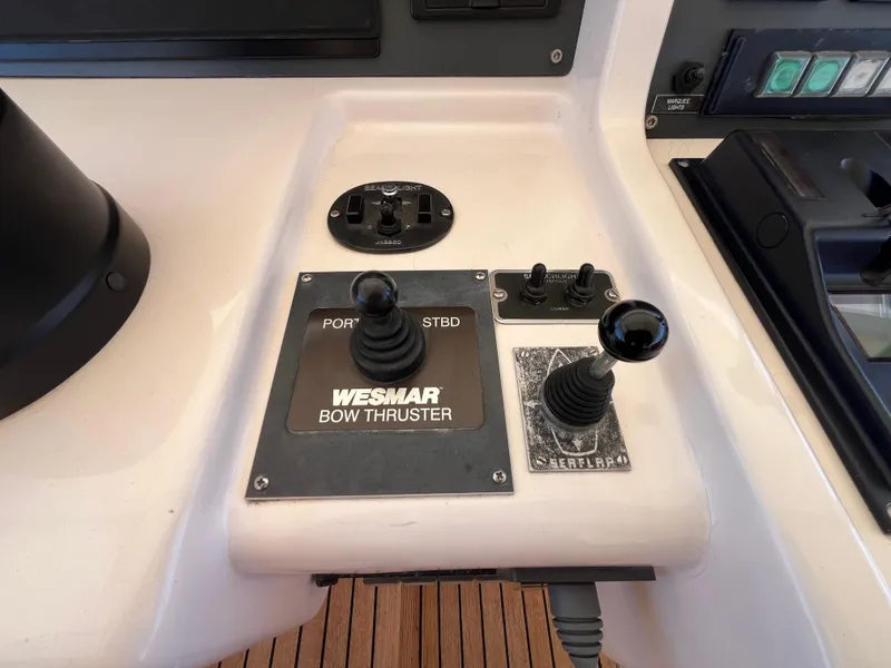 Slide: The Image of Control panel of a 2001 Astondoa 95GLX yacht featuring Wesmar bow thruster joystick. - 25