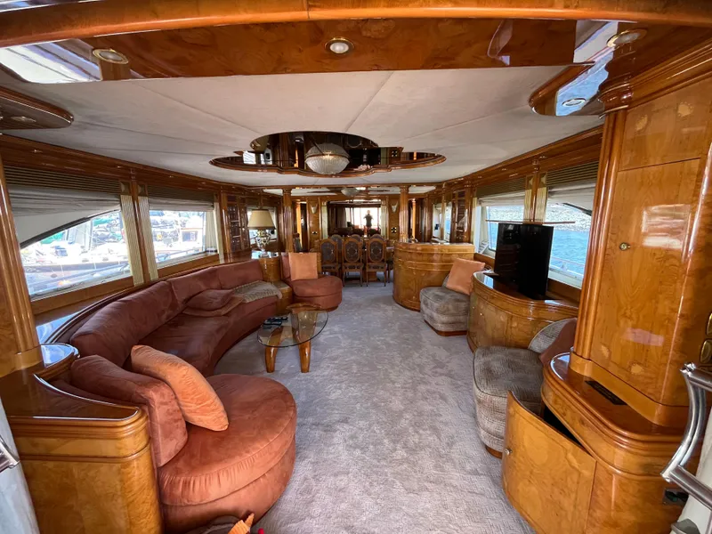 Slide: The Image of Luxurious interior of 2001 Astondoa 95GLX yacht with elegant wood finishes and plush seating. - 37