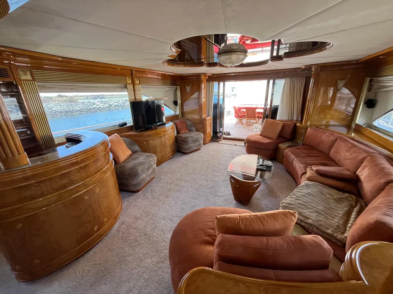 Slide: The Image of Luxurious interior of 2001 Astondoa 95GLX yacht with elegant wood finishes and plush seating. - 39