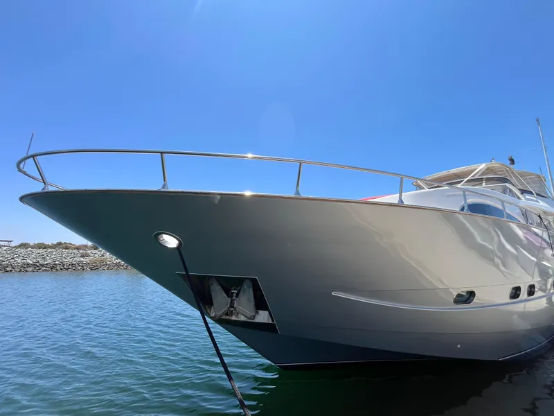 Slide: The Image of Luxury Astondoa 95GLX yacht from 2001, docked under clear blue sky. - 4