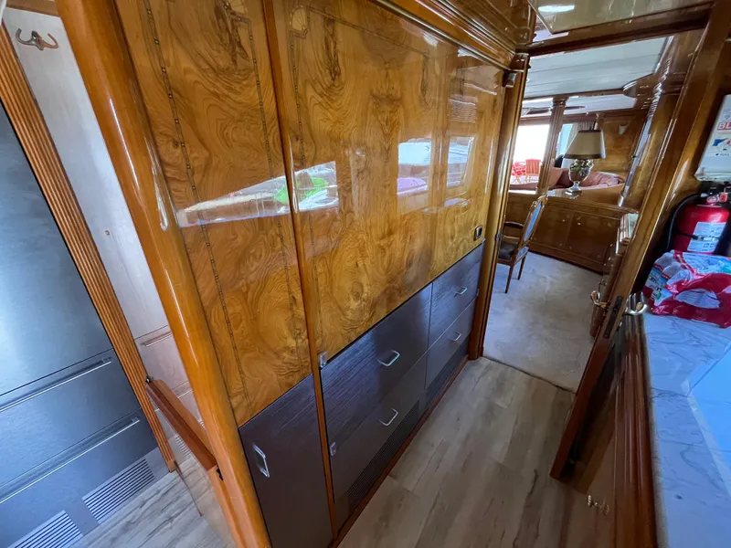 Slide: The Image of Luxurious interior of 2001 Astondoa 95GLX yacht with polished wood finishes. - 44