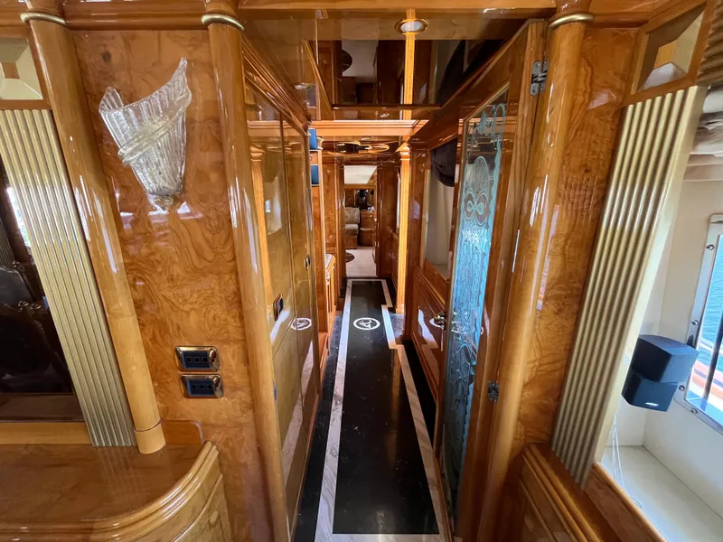 Slide: The Image of Luxurious interior of 2001 Astondoa 95GLX yacht with polished wood finishes. - 48