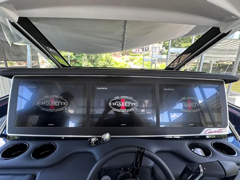 Slide: The Image of 2024 Cigarette 42 Auroris boat on a lake, featuring luxurious seating and scenic surroundings. - 10