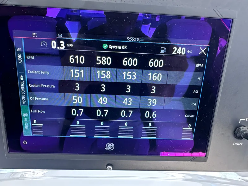 Slide: The Image of 2024 Cigarette 42 Auroris boat interior with luxurious seating on a sunny lake. - 11