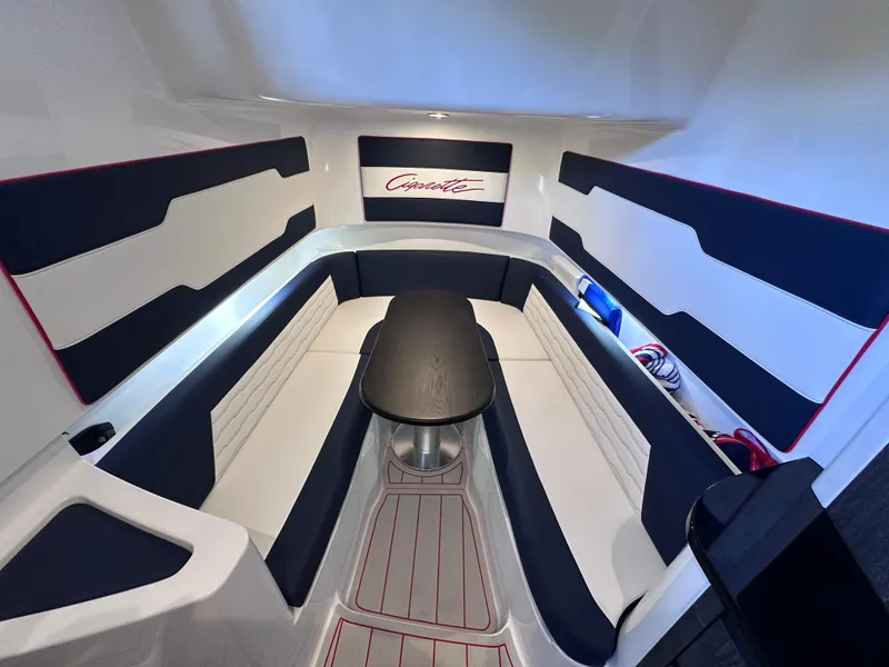 Slide: The Image of 2024 Cigarette 42 Auroris boat cruising on a sunny lake near waterfront homes. - 17