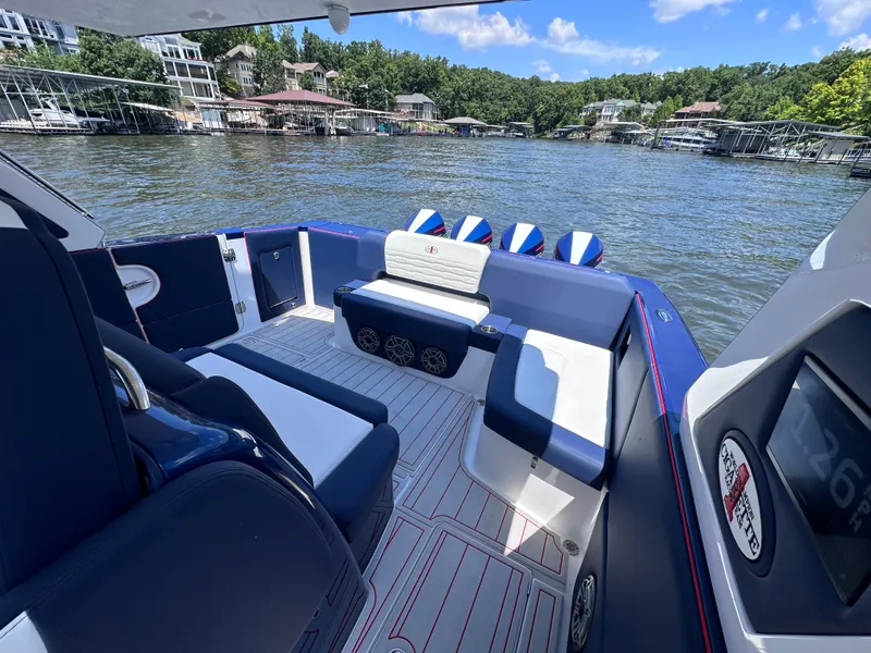 Slide: The Image of 2024 Cigarette 42 Auroris center seat control panel with up and down switch. - 24