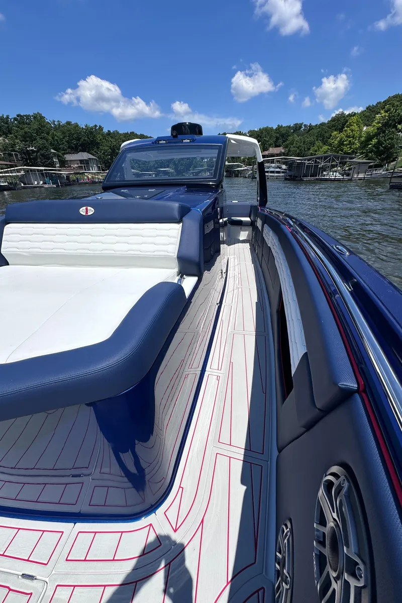 Slide: The Image of 2024 Cigarette 42 Auroris boat interior with custom flooring and branded step mats. - 29