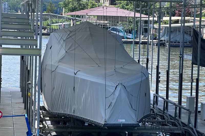 Slide: The Image of Covered 2024 Cigarette 42 Auroris boat docked at marina. - 34