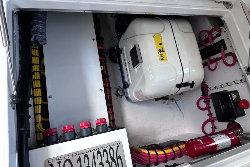 Slide: The Image of Engine compartment of 2024 Cigarette 42 Auroris with wiring and safety equipment. - 37