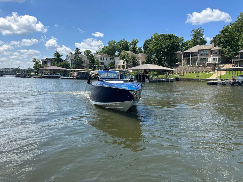 Slide: The Image of 2024 Cigarette 42 Auroris dashboard with Garmin displays and sleek design. - 4