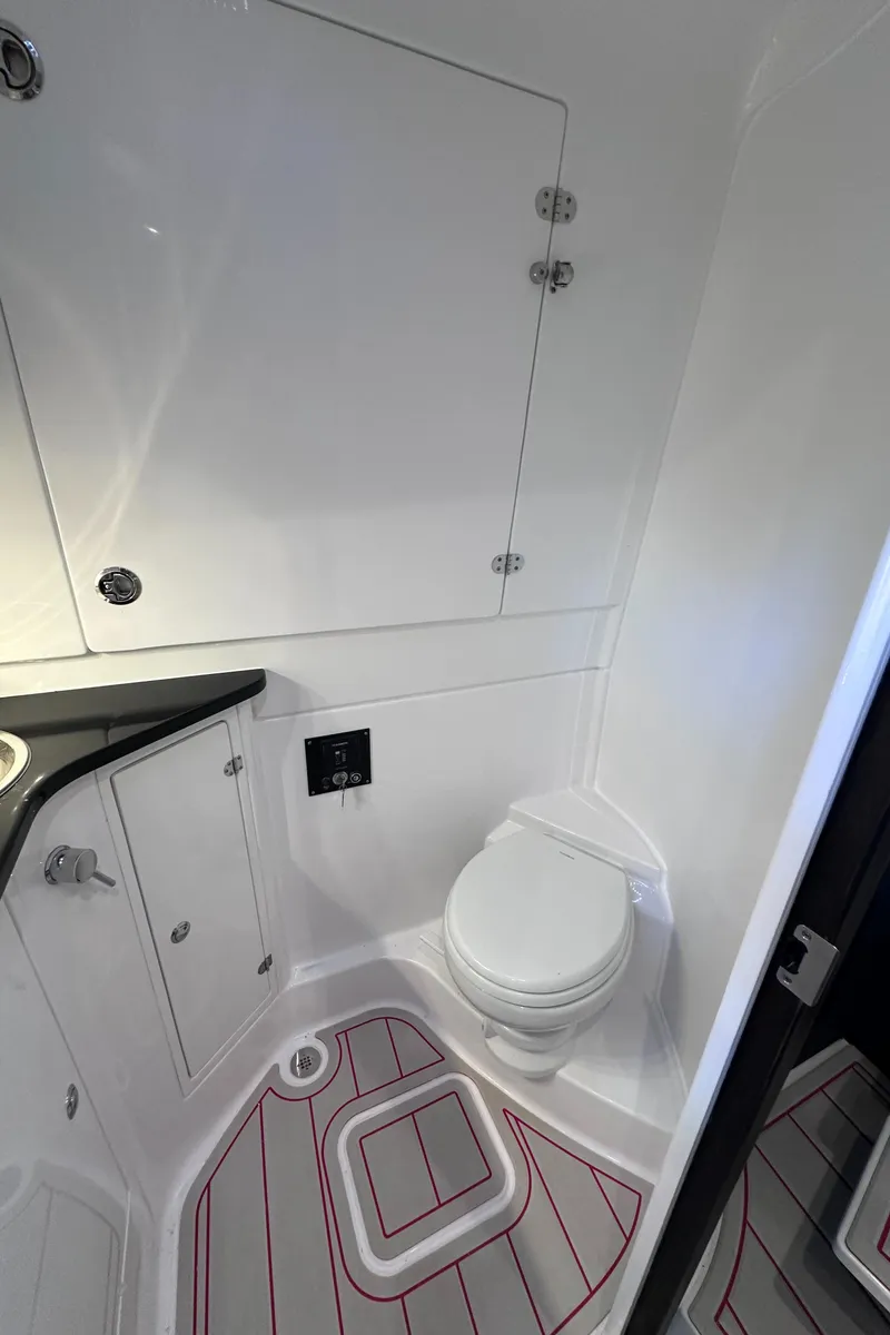 Slide: The Image of 2024 Cigarette 42 Auroris boat bathroom with modern fixtures and sleek design. - 45