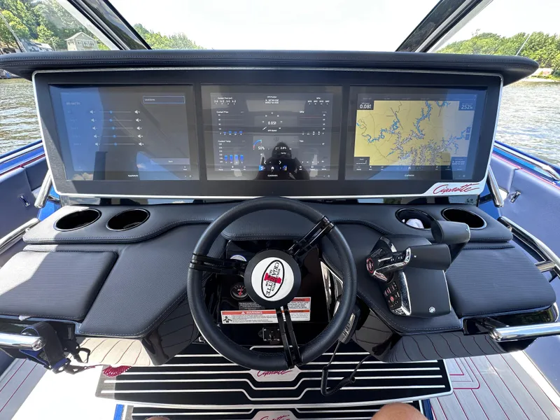 Slide: The Image of 2024 Cigarette 42 Auroris boat interior with luxurious seating and scenic water view. - 9