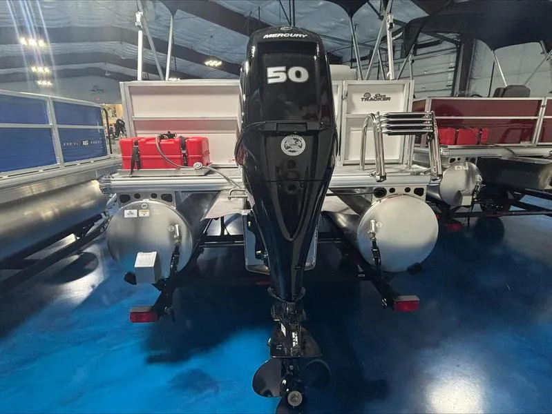 Slide: The Image of 2026 Sun Tracker PB 16 DLX pontoon boat with Mercury 50 outboard motor. - 6