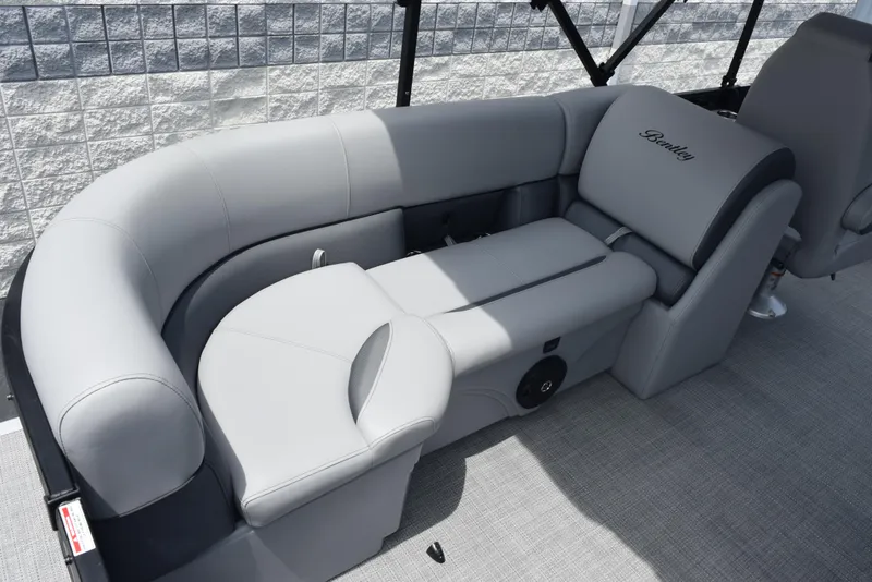 Slide: The Image of 2026 Bentley Pontoons Legacy 223 Navigator, luxurious gray seating, elegant design. - 10