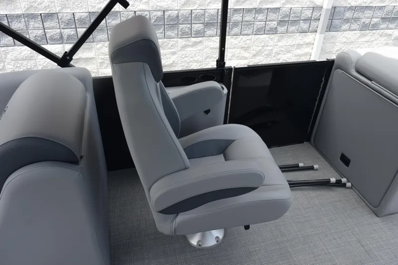 Slide: The Image of 2026 Bentley Pontoons Legacy 223 Navigator interior with sleek gray seating. - 12