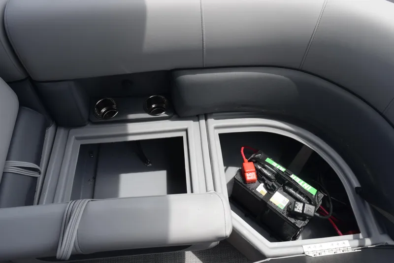 Slide: The Image of 2026 Bentley Pontoons Legacy 223 Navigator interior storage with battery compartment. - 19
