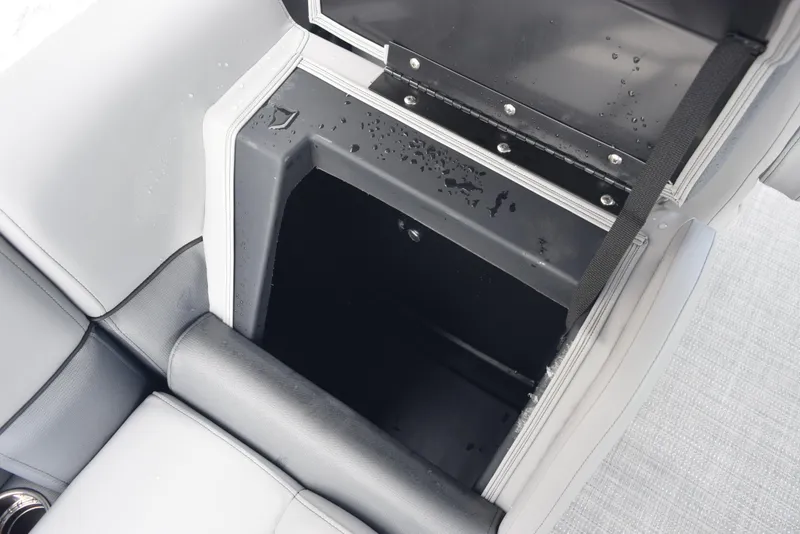 Slide: The Image of Open storage compartment in 2026 Bentley Pontoons Legacy 223 Navigator boat. - 21