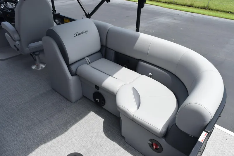 Slide: The Image of 2026 Bentley Pontoons Legacy 223 Navigator with luxurious gray seating and modern design. - 9